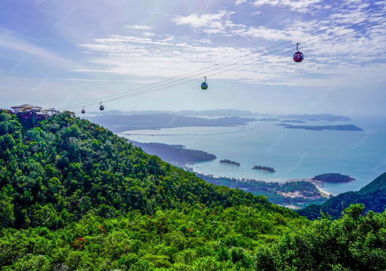 Cable cars above forested islands