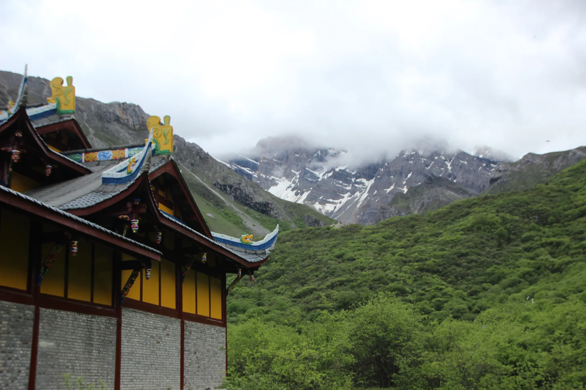 Mountain village beneath low clouds