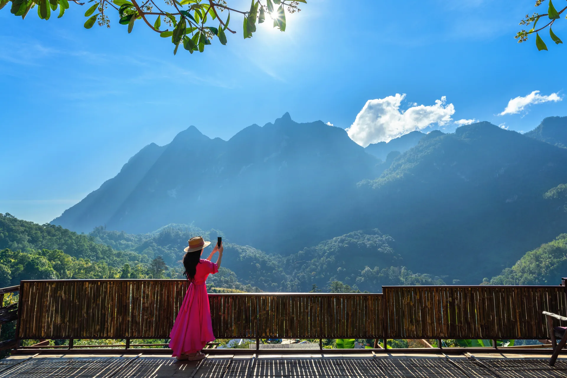 Traveller photographing the mountains